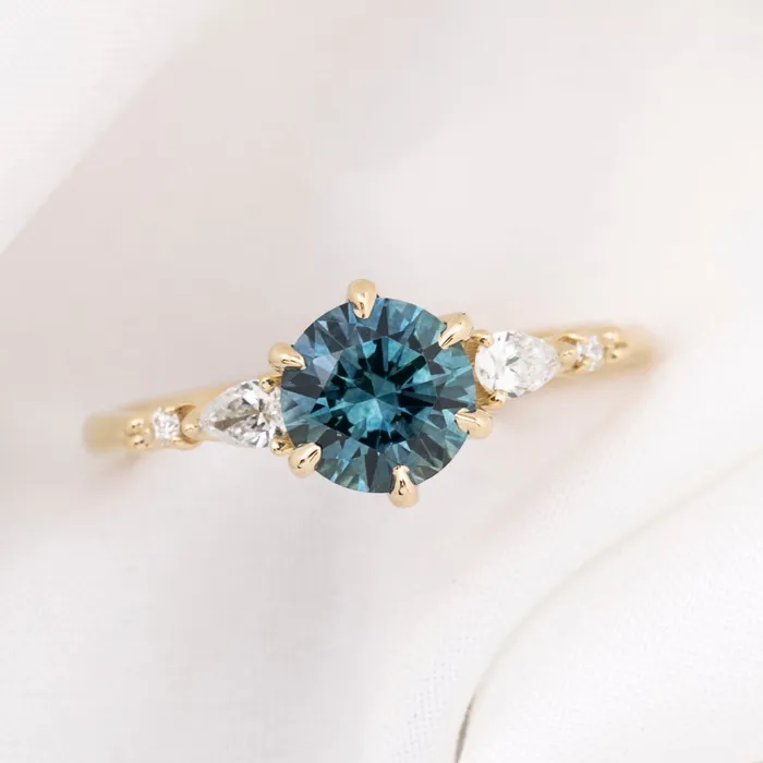 Rings Envero Jewelry Estel Fleur Petal Ring 130ct Teal Blue Montana Sapphire 14k Yellow Gold One of a kind Rings Envero Jewelry Estel Fleur Petal Ring 130ct Teal Blue Montana Sapphire 14k Yellow Gold One of a kind